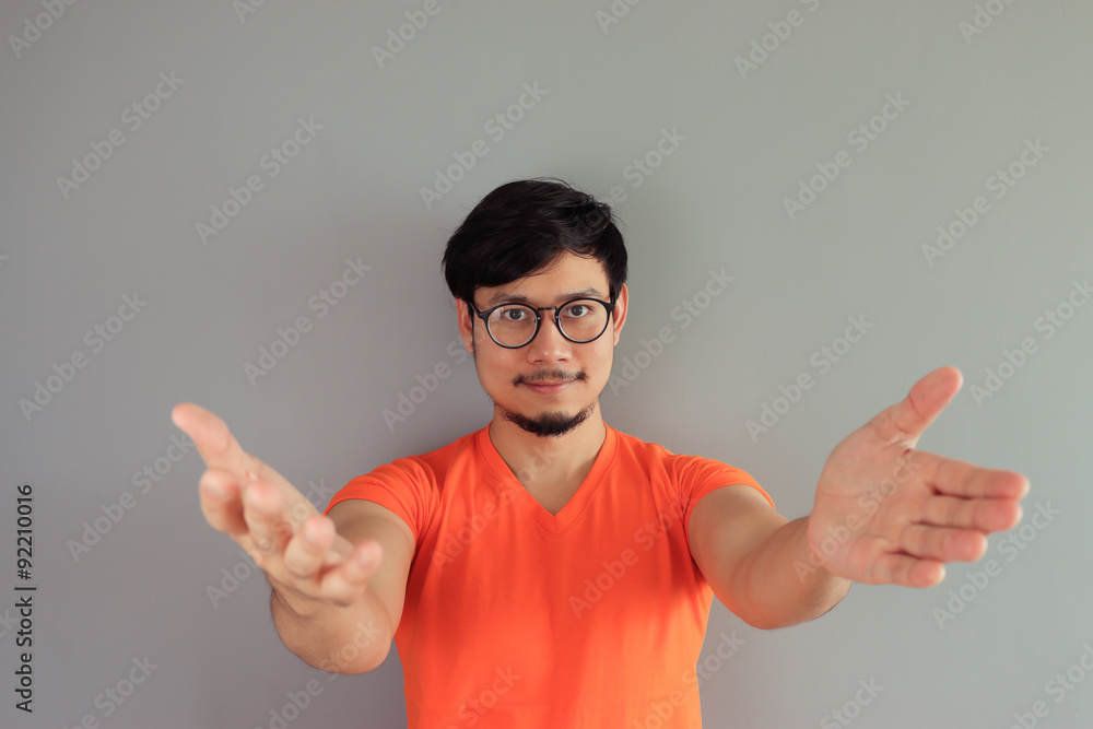 Happy man in Orange T-shirt. Happy man in Orange T-shirt.