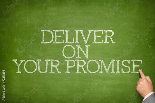Fototapeta Naklejka Na Ścianę i Meble -  Deliver on your promise text on blackboard