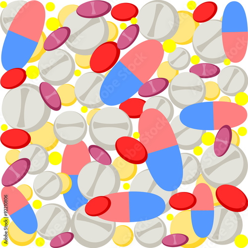 Colorful pills at white background