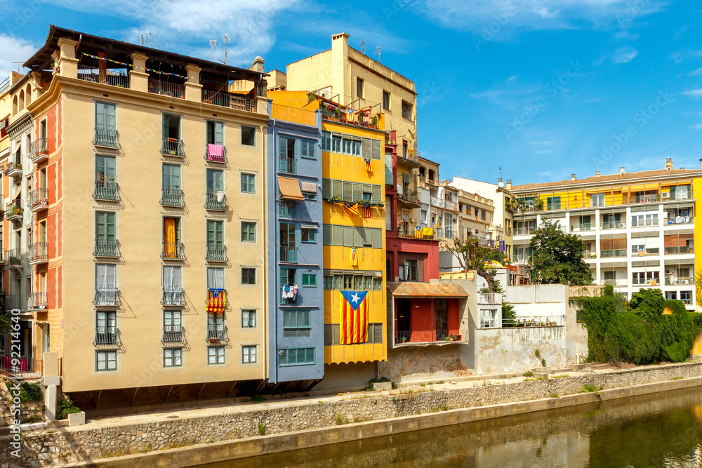 Girona. Multi-colored facades of houses on the river Onyar. Girona. Multi-colored facades of houses on the river Onyar.