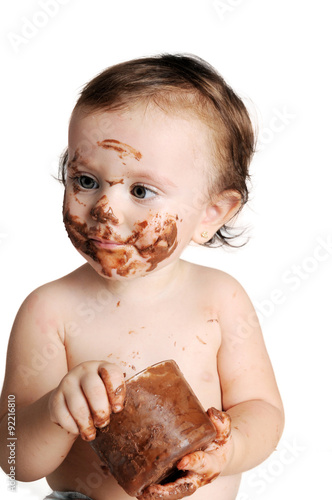 Baby enjoying the moment  eating chocolate