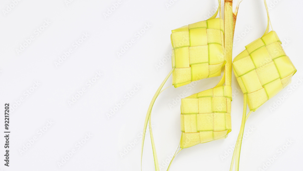 Ketupat (Rice Dumpling) On White Background.Ketupat Is A Natural Rice Casing Made From Young Coconut Leaves For Cooking Rice During Eid Mubarak.