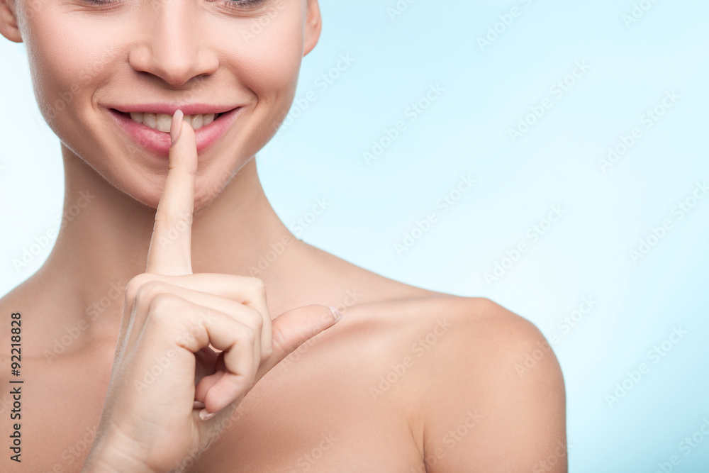 Attractive young healthy woman is requiring silence Attractive young healthy woman is requiring silence
