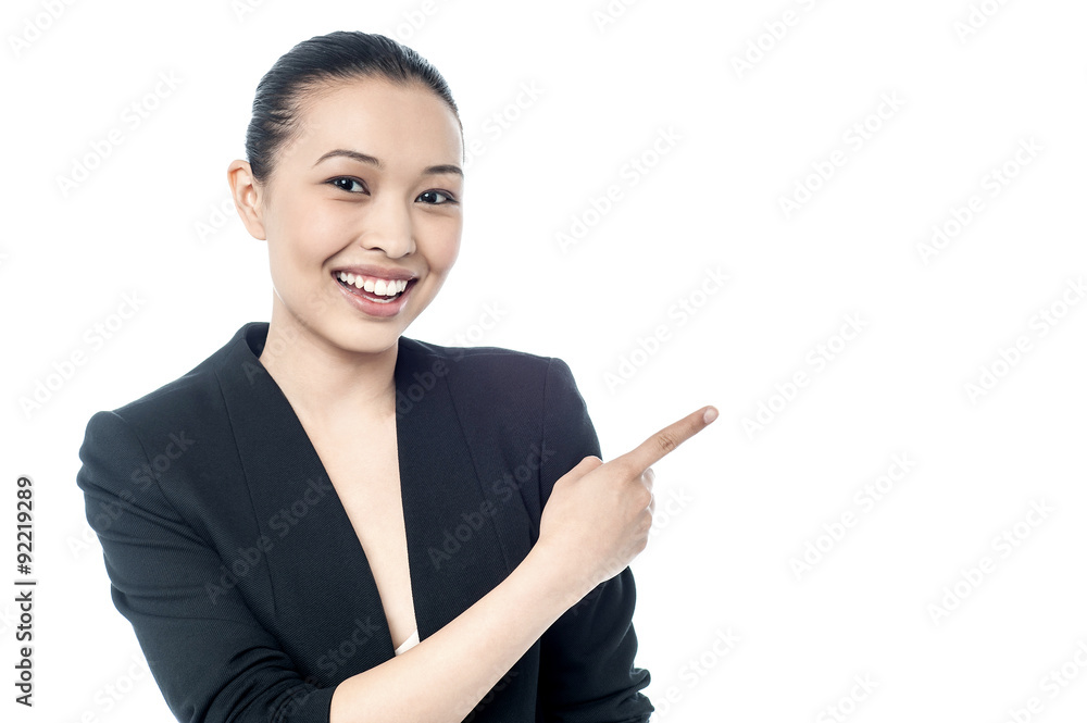 Female executive pointing at something Female executive pointing at something