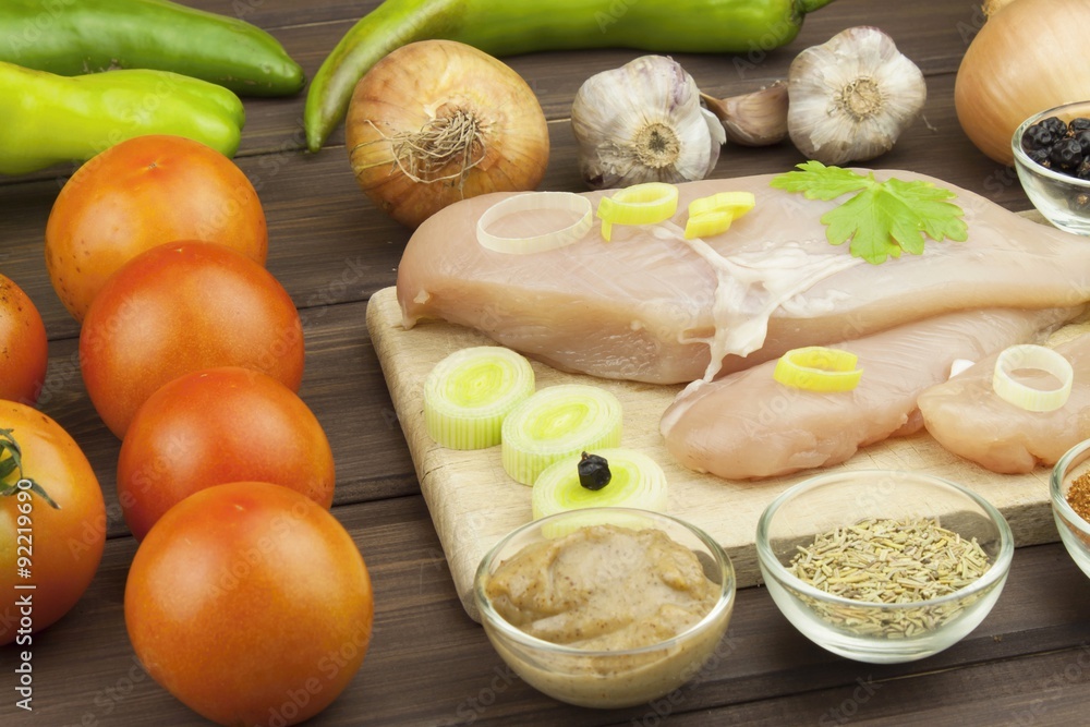 Preparing Diet food. Fresh raw chicken fillet and vegetables prepared for cooking. Fresh raw chicken breasts. Preparing chicken at a summer barbecue. Cooking with fresh dietary ingredients.
Preparing Diet food. Fresh raw chicken fillet and vegetables prepared for cooking. Fresh raw chicken breasts. Preparing chicken at a summer barbecue. Cooking with fresh dietary ingredients.