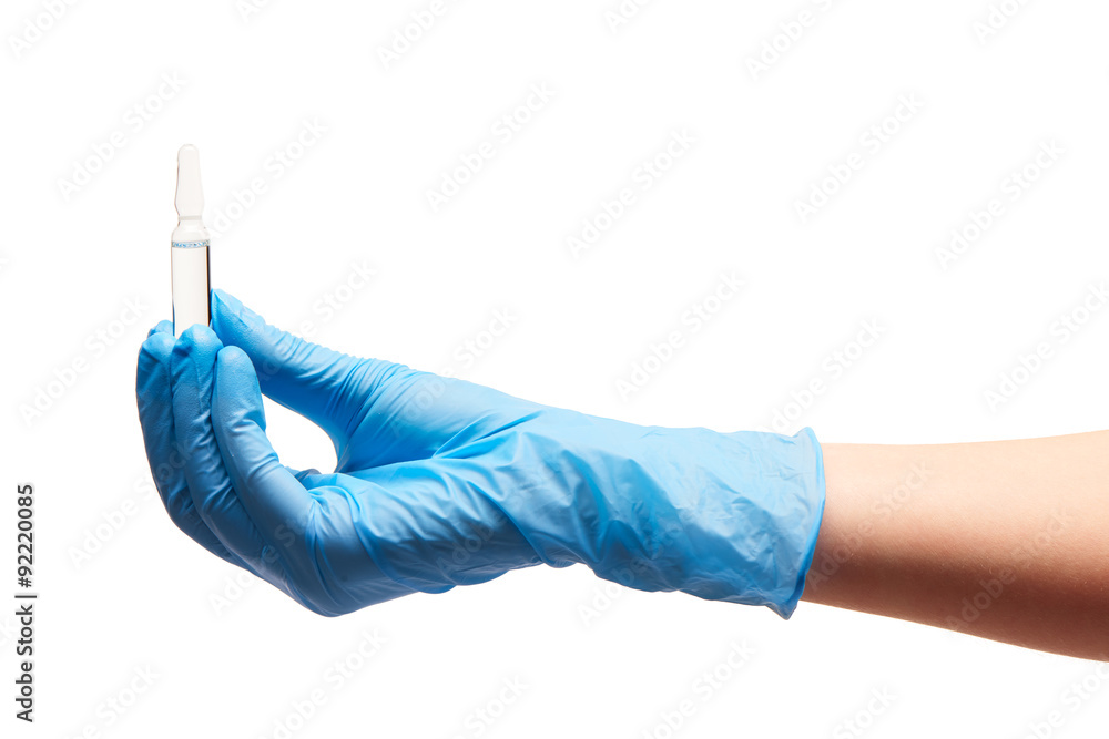 Φωτογραφία Close up of female doctor's hand in blue sterilized surgical glove holding trans