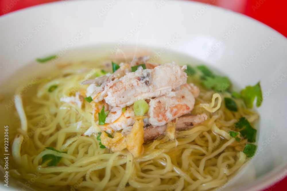 Chinese egg noodles with crab meat in hot soup, Thai food.