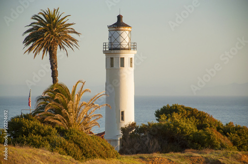 Palos Verdes lighthouse with palm tree and ocean