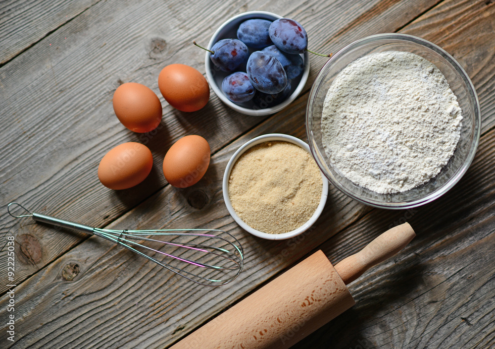 Baking plum cake in rural kitchen Baking plum cake in rural kitchen
