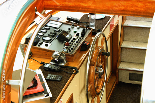 yacht interior with a steering wheel photo