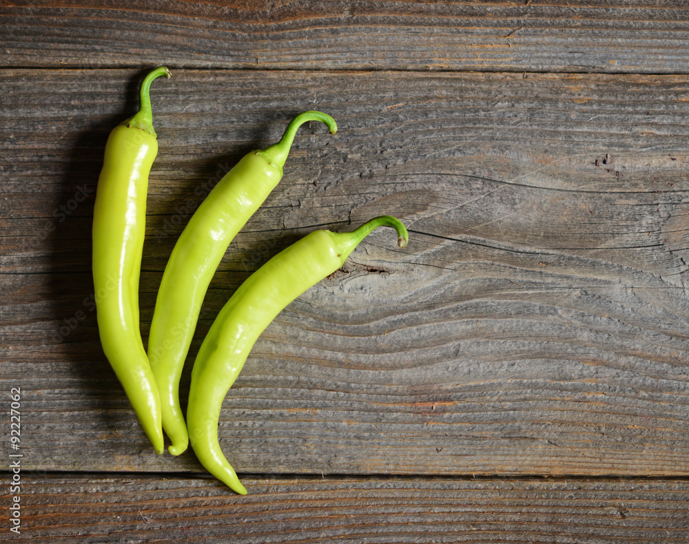 Yellow pepper on the wooden background Yellow pepper on the wooden background