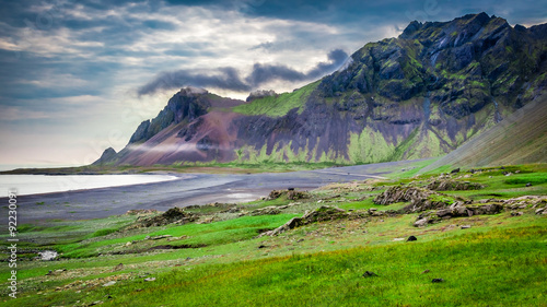 Volcanic mountain at the se...