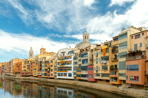 Print op canvas Girona. Multi-colored facades of houses on the river Onyar.