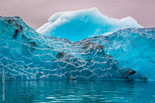 Blue iceberg in cold lake, Iceland