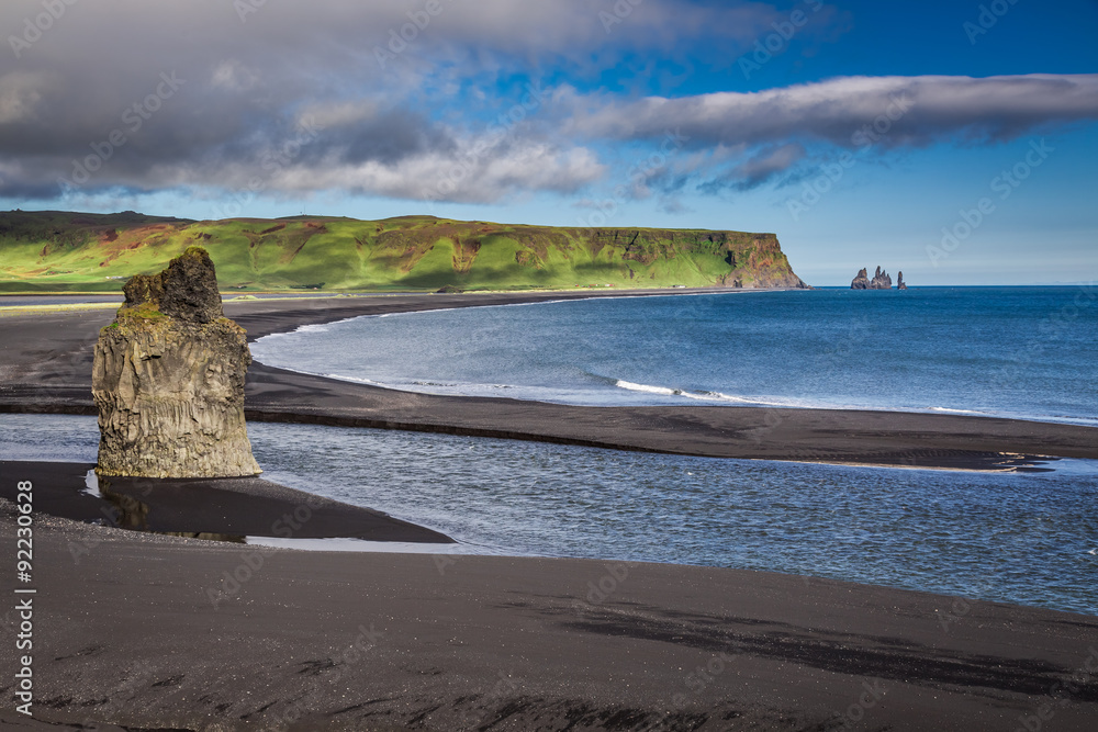 Big rock on the black beach in Iceland