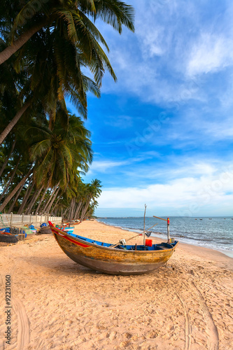 The Vietnamese boat on a sea beach
