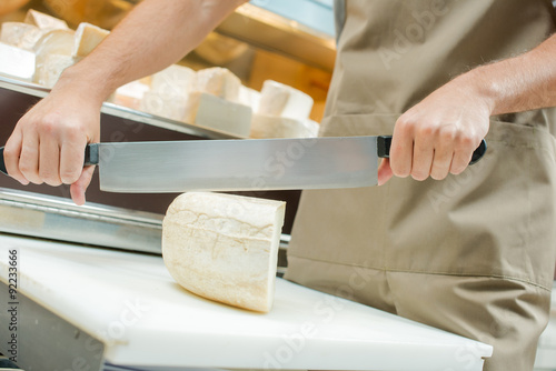 Slicing a block of cheese
