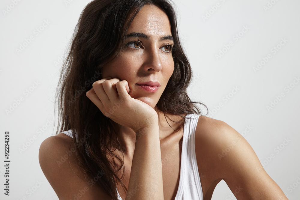 spanish woman watching aside spanish woman watching aside