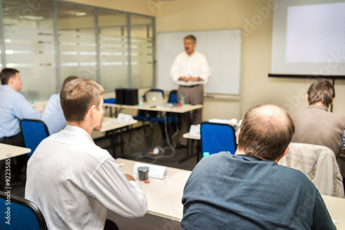 The audience listens to the acting in a computer classroom