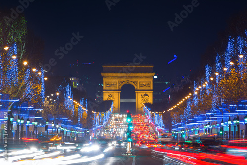Photography Avenue des Champs-Elysees with Christmas lighting leading up to the Arc de Triom