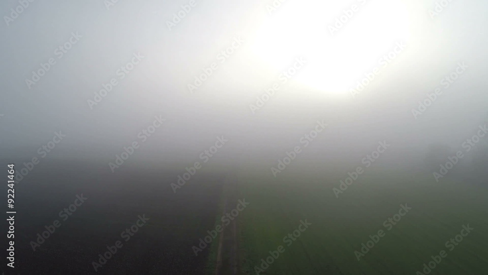 Aerial flight during a foggy day in Switzerland Aerial flight during a foggy day in Switzerland