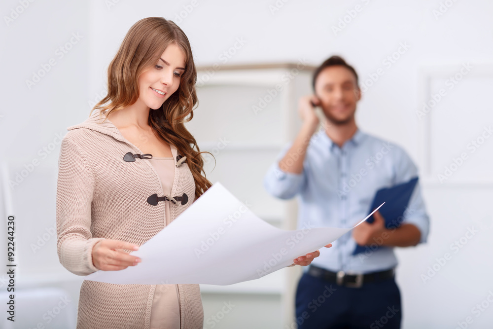 Pleasant realtor showing flat to client Pleasant realtor showing flat to client