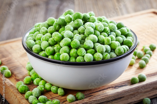 bowl of frozen green peas © Mara Zemgaliete