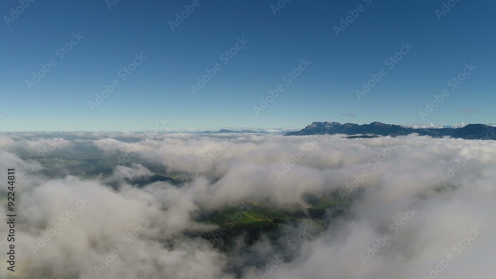 Aerial Flight over a sea of fog, Switzerland Aerial Flight over a sea of fog, Switzerland