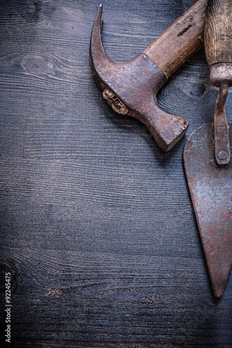 copyspace old rusted hammer and spattle photo