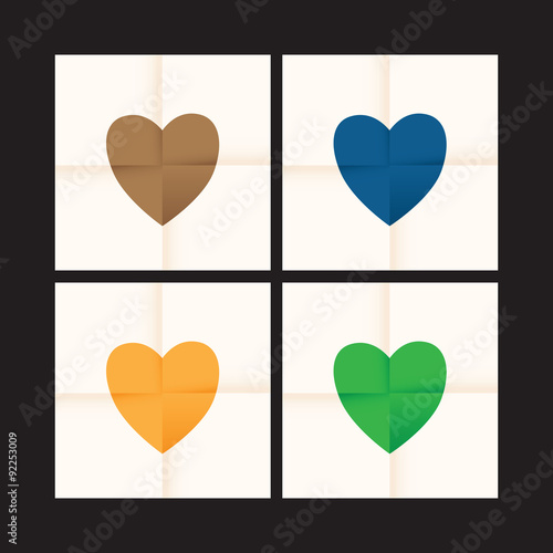 set of hearts on folded paper