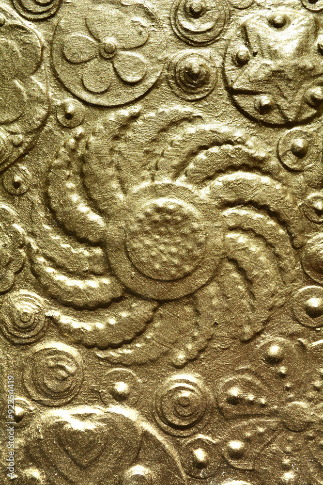 Gold textured surface, golden background.