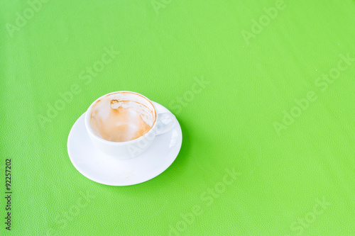 Milk foam remainning in white cup