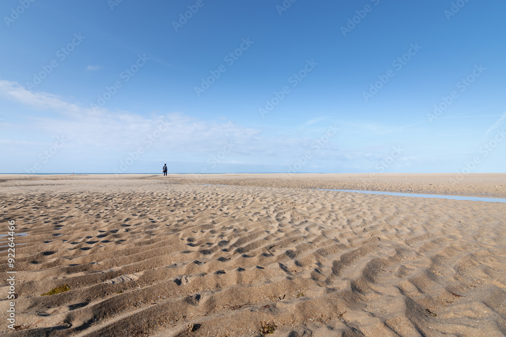 on the Beach of Portbail, Normandy, France at low tide on the Beach of Portbail, Normandy, France at low tide