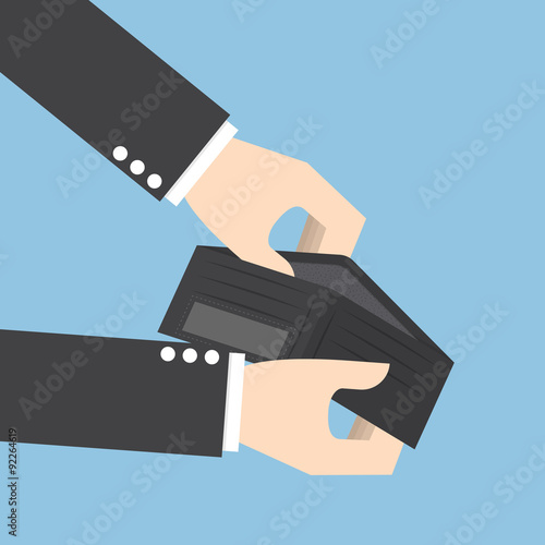 Businessman holding an empty wallet