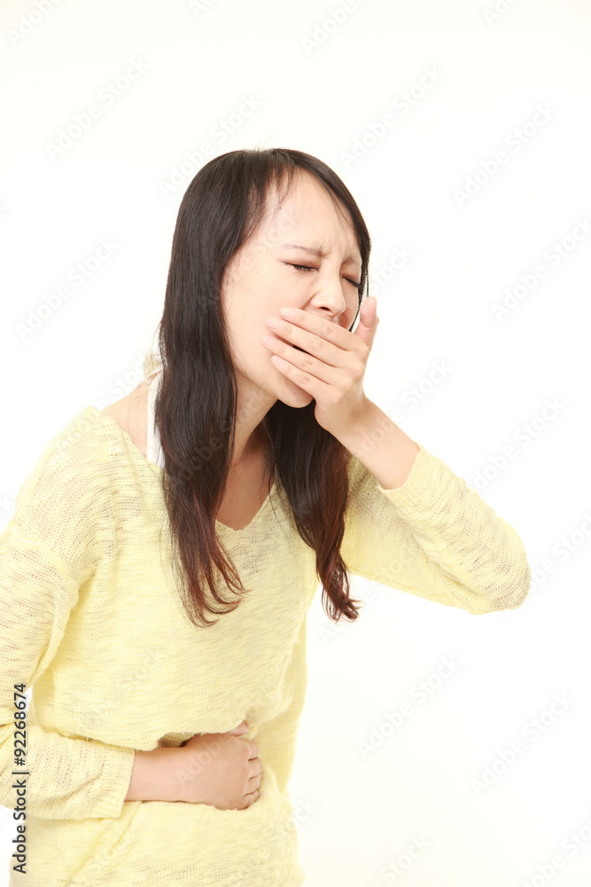 young Japanese woman feels like vomiting young Japanese woman feels like vomiting