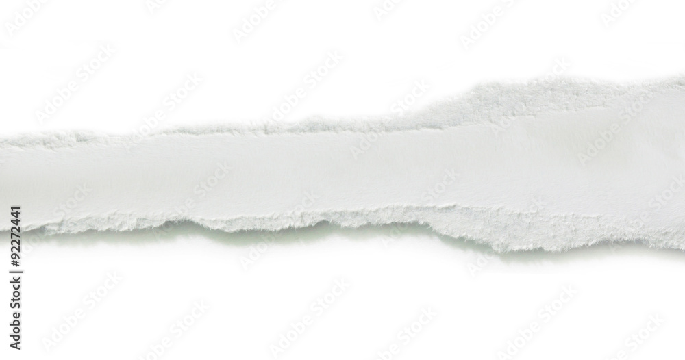 Obraz premium close up of a white ripped piece of paper on white background