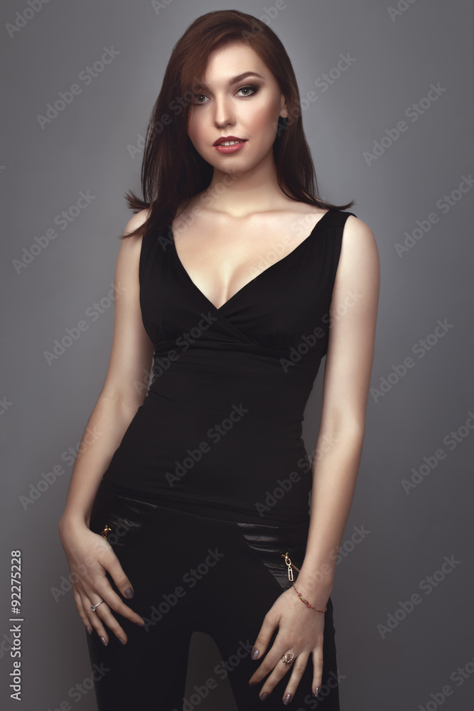 the beautiful girl poses in studio the beautiful girl poses in studio