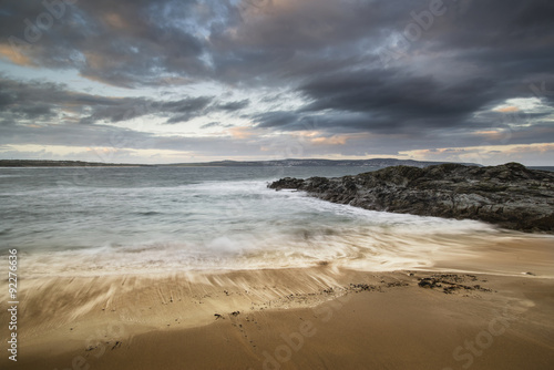 Beautiful sunrise landscape of Godrevy on Cornwall coastline in