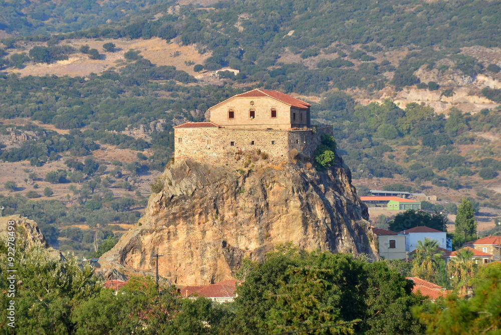 church of Our Lady of the Sweet Kiss sits atop a rock outcrop above the town of Petra, Lesbos