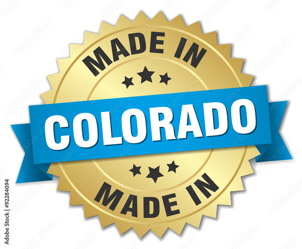 made in Colorado gold badge with blue ribbon