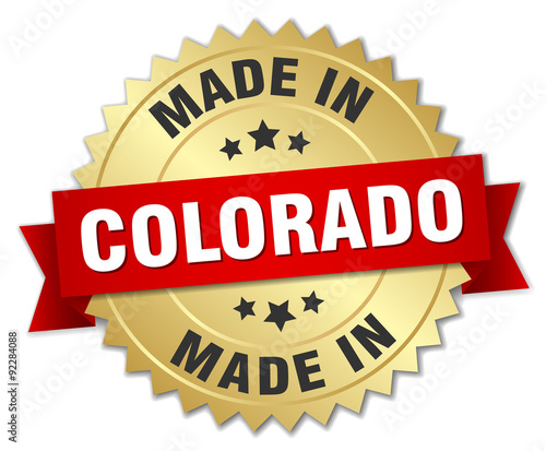 made in Colorado gold badge with red ribbon