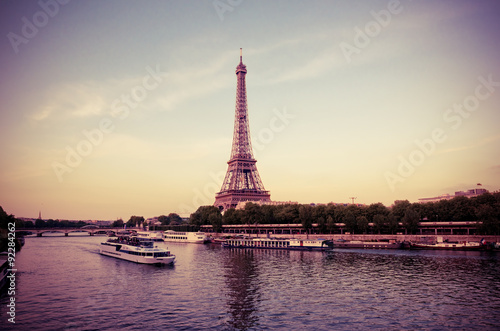 Eiffel Tower with boats in evening Paris, France © Valeri Luzina