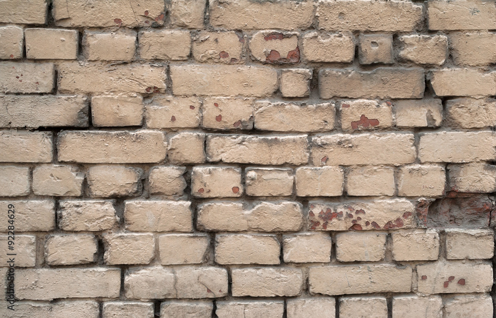 Texture of old crumbling brick walls, painted gray Texture of old crumbling brick walls, painted gray