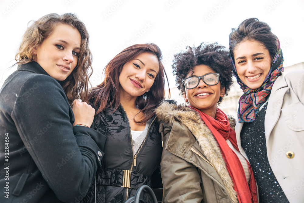 Four young beautiful girls smiling Four young beautiful girls smiling
