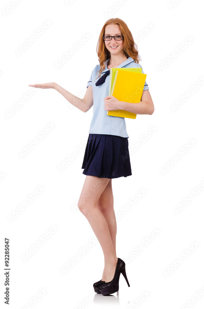 Young diligent student with textbooks isolated on white Young diligent student with textbooks isolated on white