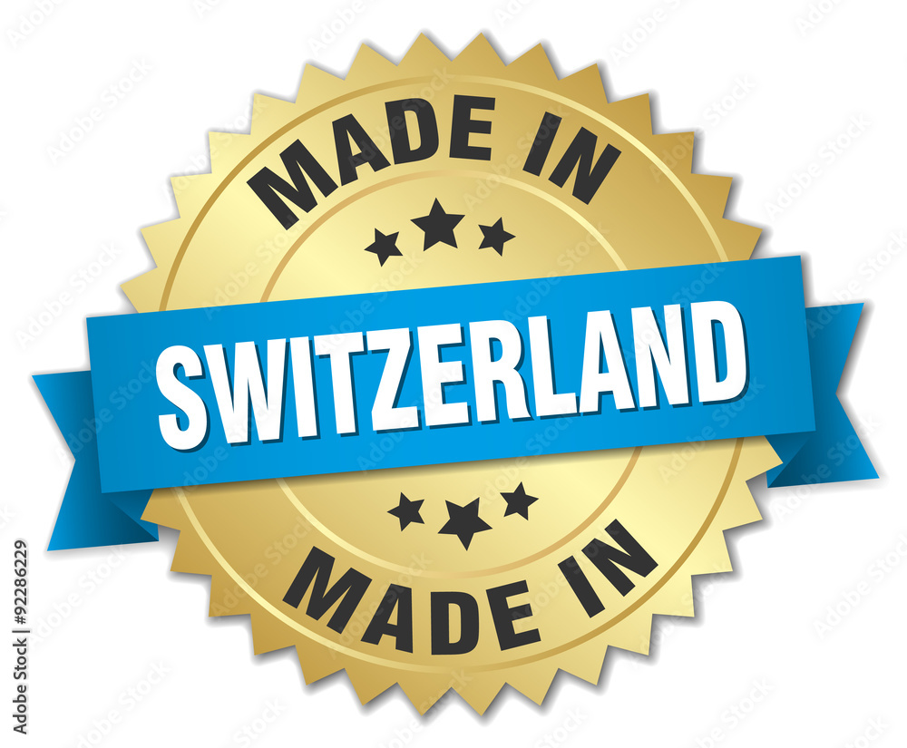 made in Switzerland gold badge with blue ribbon