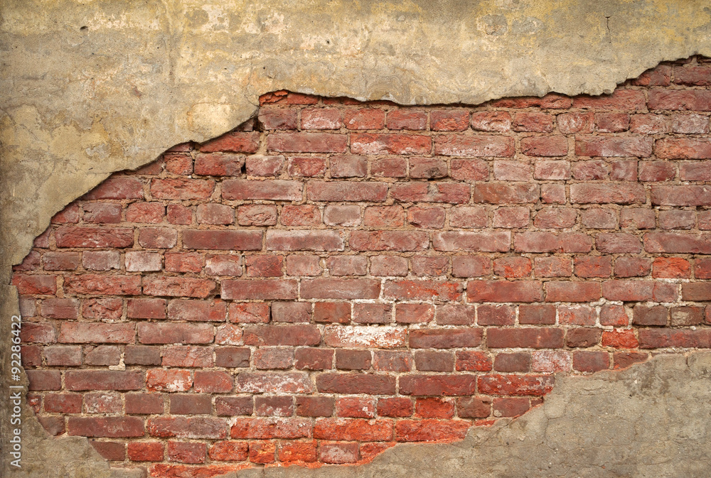 Texture of old wall covered with yellow stucco Texture of old wall covered with yellow stucco