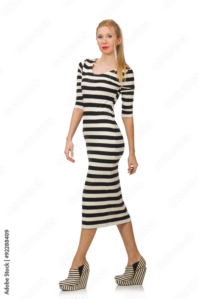 Young woman in long striped dress isolated on white Young woman in long striped dress isolated on white