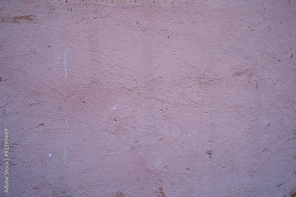 Texture of old wall covered with pink stucco Texture of old wall covered with pink stucco