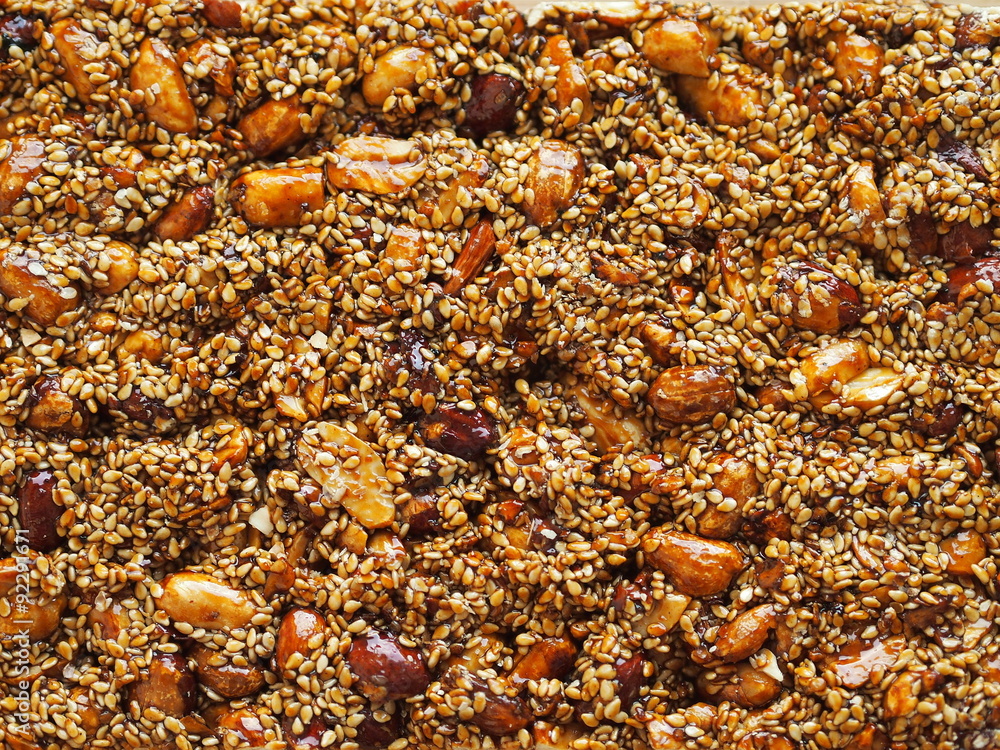 Sweet snack from Cyprus - sesame seeds in honey with almonds and peanuts. Sweet snack from Cyprus - sesame seeds in honey with almonds and peanuts.